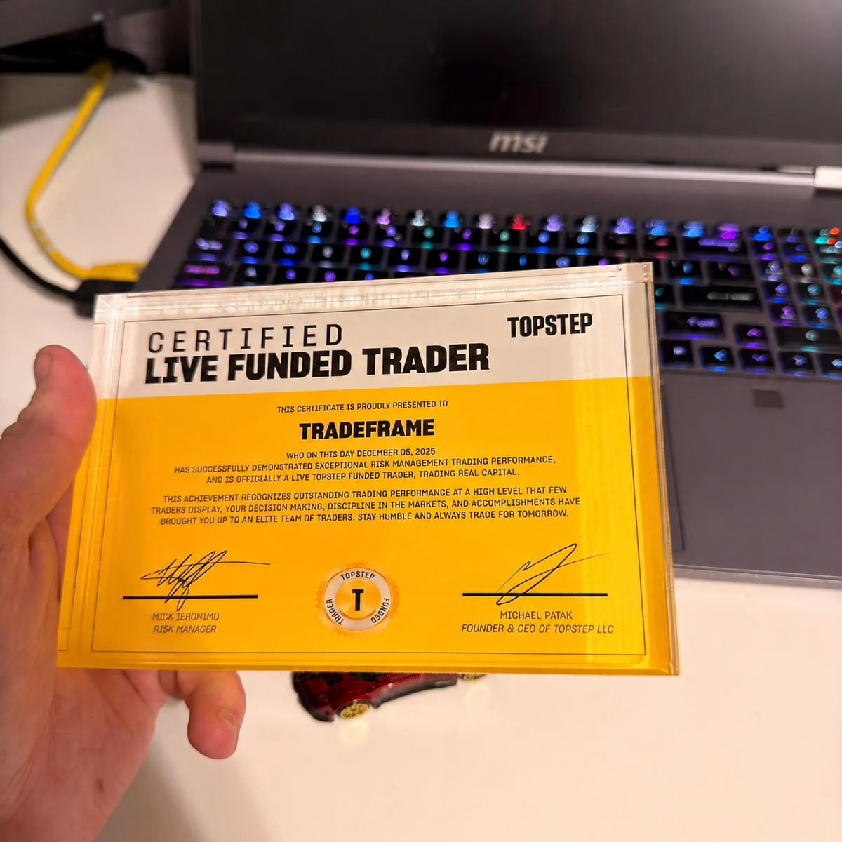 Close view of TradeFrame acrylic certificate block
